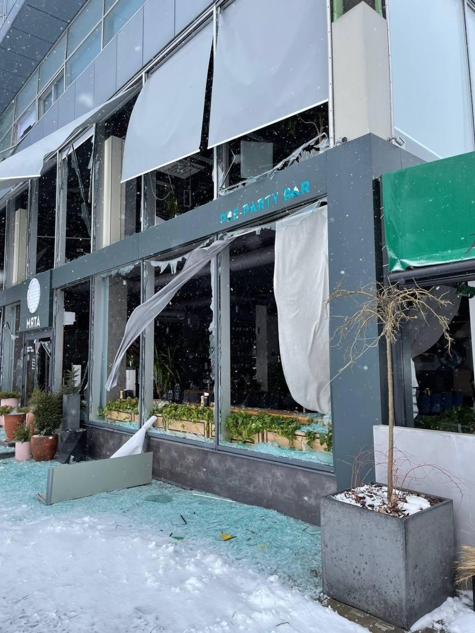 In this photo provided by Yurii Kochubei, a view of the damage after shelling on a sports venue, in Kharkiv, Ukraine, Saturday, March 5, 2022. An official in one of Ukraine's pro-Russia separatist region says Russian forces will observe a temporary cease-fire Sunday in two Ukrainian cities. An agreement to allow civilians to evacuate collapsed a day earlier amid continued shelling and the flight of refugees to neighboring nations. (Yurii Kochubei via AP)