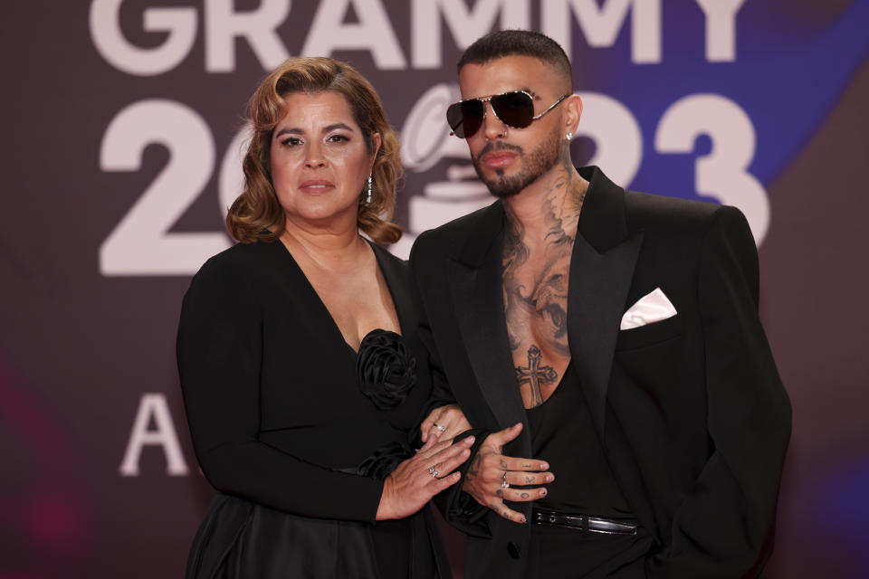 Maria Nelly Ruiz, left, and Rauw Alejandro arrive at the 24th annual Latin Grammy Awards in Seville, Spain, Thursday, Nov. 16, 2023. (Photo by Vianney Le Caer/Invision/AP)