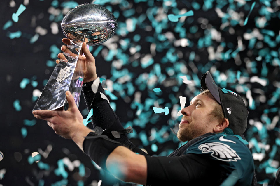 <p>MINNEAPOLIS, MN – FEBRUARY 04: Quarterback Nick Foles #9 of the Philadelphia Eagles raises the Vince Lombardi Trophy after defeating the New England Patriots, 41-33, in Super Bowl LII at U.S. Bank Stadium on February 4, 2018 in Minneapolis, Minnesota. (Photo by Patrick Smith/Getty Images) </p>