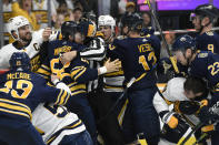 The Nashville Predators and Buffalo Sabres fight during the second period of an NHL hockey game Saturday, Jan. 18, 2020, in Nashville, Tenn. (AP Photo/Mark Zaleski)