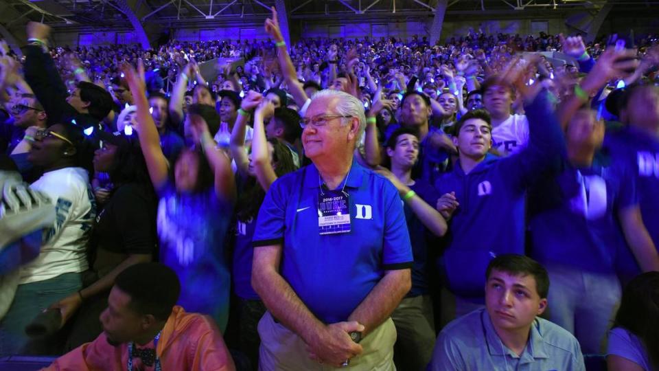 Bob Harris is surrounded by Cameron Crazies during “Countdown to Craziness” at Cameron Indoor Stadium, in Durham, N.C. Saturday, October 22, 2016.