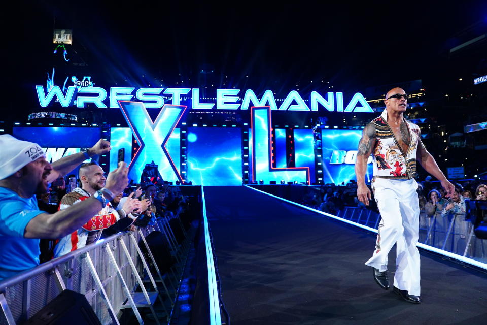 PHILADELPHIA, PENNSYLVANIA - APRIL 7: The Rock enters the ring on Night Two of WrestleMania 40 at Lincoln Financial Field on April 7, 2024 in Philadelphia, Pennsylvania. (Photo by WWE/Getty Images)