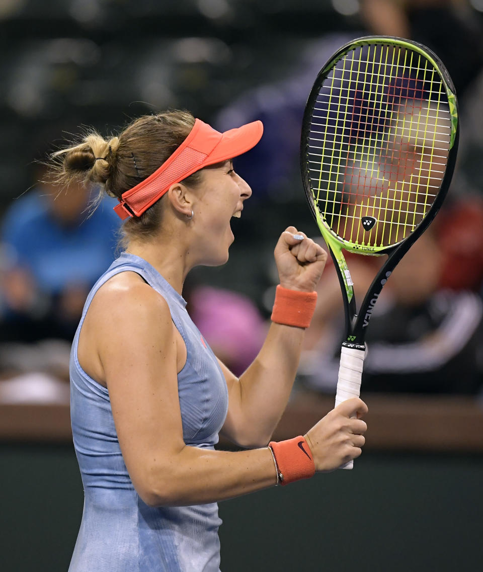 Belinda Bencic, of Switzerland, reacts during the match against Naomi Osaka at the BNP Paribas Open tennis tournament Tuesday, March 12, 2019 in Indian Wells, Calif. (AP Photo/Mark J. Terrill)