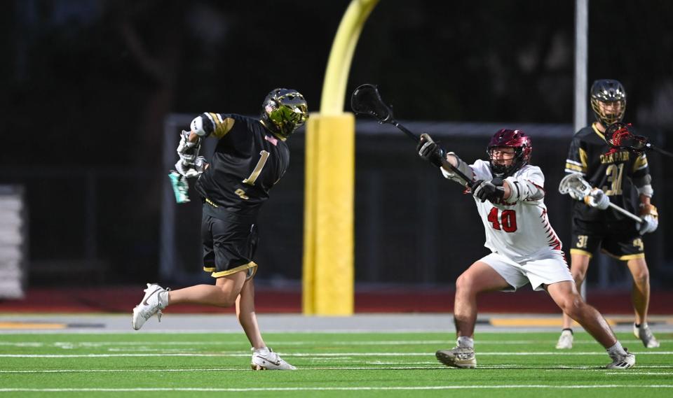 Oak Park's Tyler Kang fires a shot during the Eagles' 14-0 win over Grace Brethren on Tuesday, April 16, 2024. Oak Park has won nine straight games.