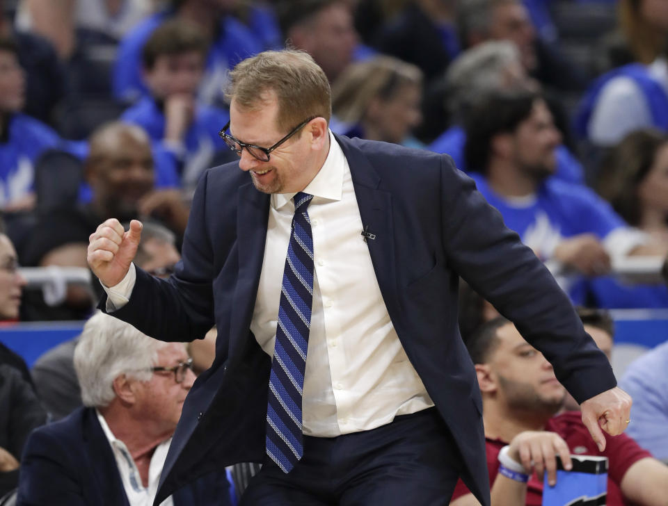 Toronto Raptors head coach Nick Nurse pumps his fist after his team scored a basket against the Orlando Magic during the second half in Game 3 of a first-round NBA basketball playoff series, Friday, April 19, 2019, in Orlando, Fla. (AP Photo/John Raoux)