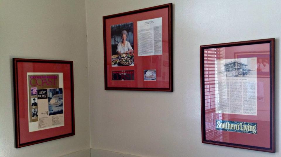 MARY PEREZ/SUN HERALD A wall of fame at the new Fisherman’s Wharf on Lemoyne Boulevard in the D’Iberville-St. Martin pays tribute to the family members who built the popular Coast restaurant.