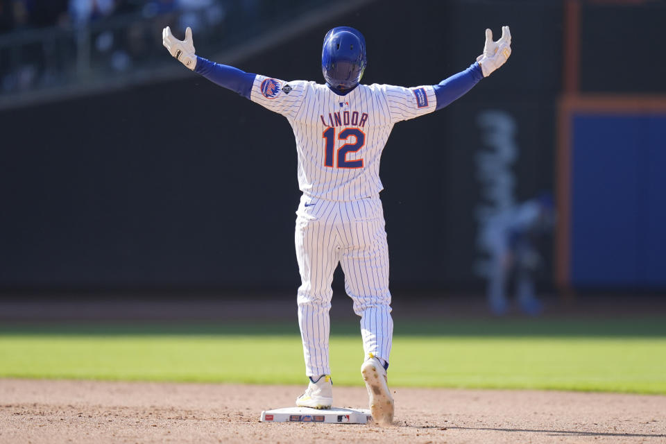 New York Mets' Francisco Lindor reacts after hitting a walk-off two-run double in the 11th inning of a baseball game against the Chicago Cubs at Citi Field, Thursday, May 2, 2024, in New York. The Mets defeated the Cubs 7-6 in 11 innings. (AP Photo/Seth Wenig)