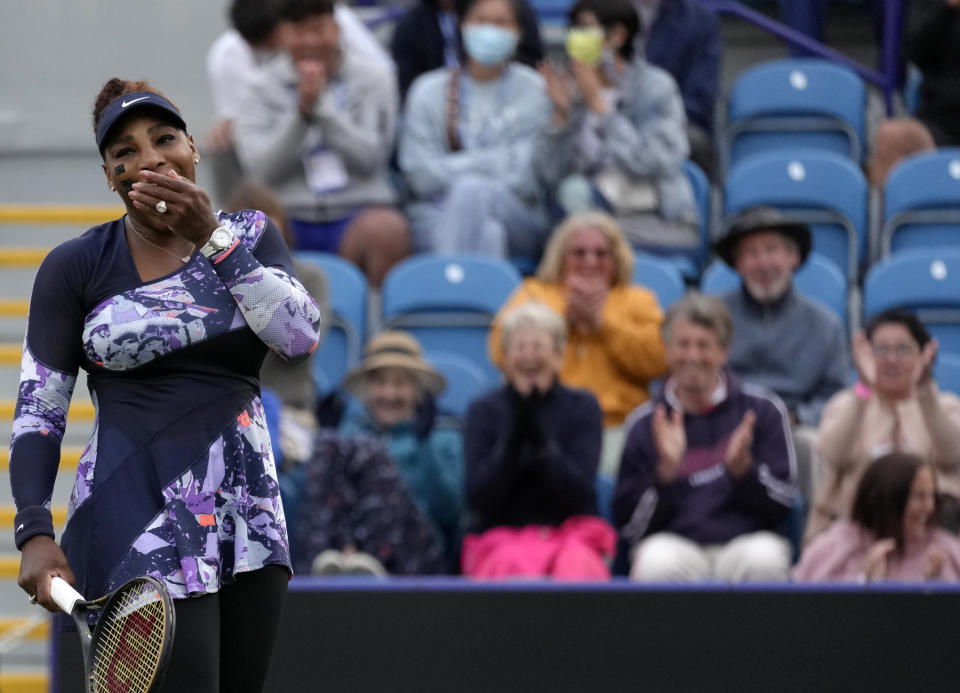 Serena Williams of the United States reacts during their doubles tennis match with Ons Jabeur of Tunisia against Marie Bouzkova of Czech Republic and Sara Sorribes Tormo of Spain at the Eastbourne International tennis tournament in Eastbourne, England, Tuesday, June 21, 2022. (AP Photo/Kirsty Wigglesworth)