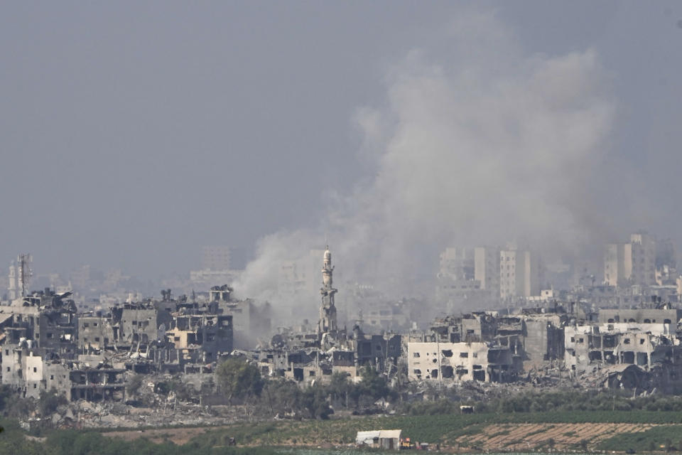 Smoke rises following an Israeli airstrike in the Gaza Strip, as seen from southern Israel, Saturday, Oct. 28, 2023. (AP Photo/Ohad Zwigenberg)