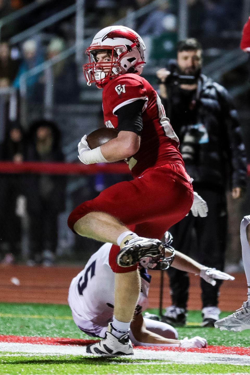 Clinton Township Chippewa Valley wide receiver Evan DeBucci runs for a first down against Macomb Dakota during the first half of a MHSAA Division 1 district final at Chippewa Valley High School in Clinton Township on Friday, Nov. 3, 2023