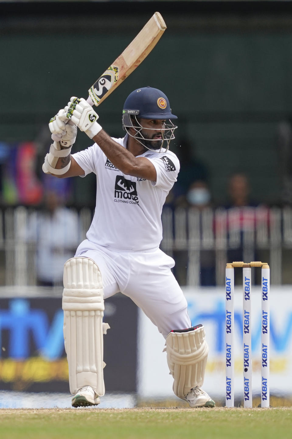 Sri Lanka's Dimuth Karunaratne plays a shot during the fourth day of the second cricket test match between Sri Lanka and Pakistan in Colombo, Sri Lanka on Thursday, Jul. 27. (AP Photo/Eranga Jayawardena)