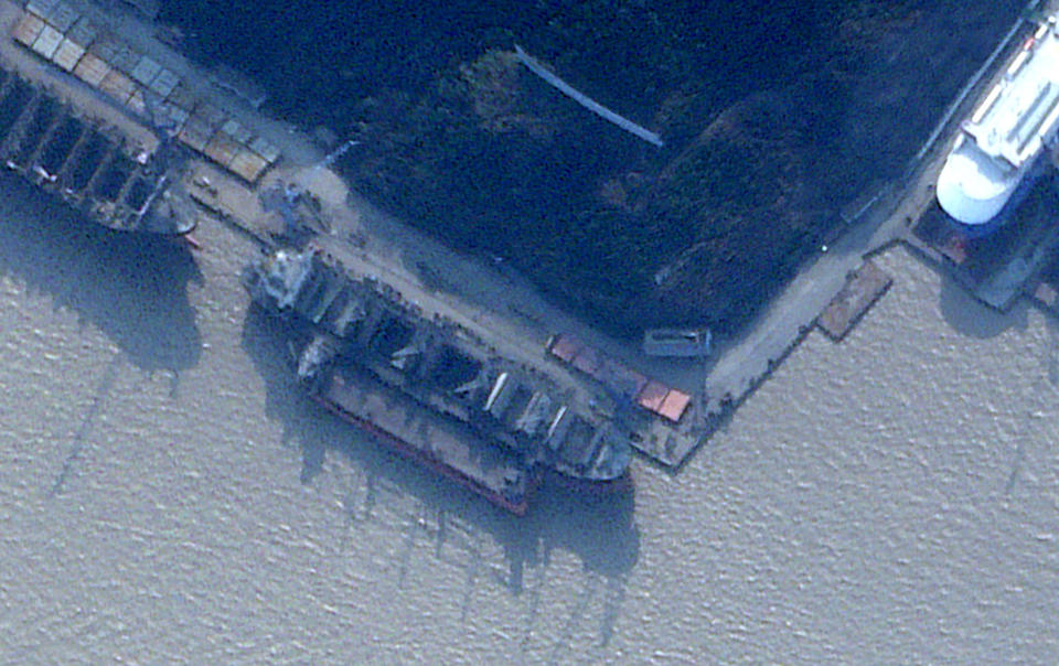 A ship, identified by the Royal United Services Institute (RUSI) as the Russian-flagged cargo ship Angara, is seen docked alongside a larger vessel at the Zhoushan Xinya Shipbuilding Co wharf in Zhoushan, China February 11, 2024 in a satellite image.  Planet Labs PBC/Handout via REUTERS THIS IMAGE HAS BEEN SUPPLIED BY A THIRD PARTY.NO RESALES. NO ARCHIVES. MANDATORY CREDIT. REFILE - CORRECTING 