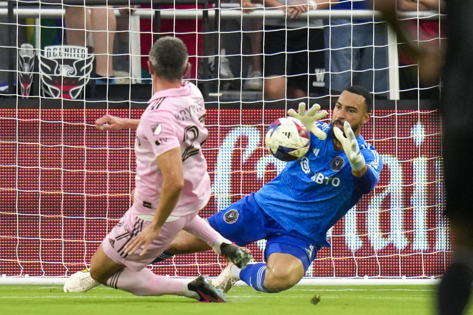 Inter Miami defender Serhiy Kryvtsov, left, and goalkeeper Drake Callender combine to stop a shot by D.C. United during the first half of an MLS soccer match Saturday, July 8, 2023, in Washington. (AP Photo/Alex Brandon)