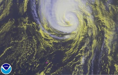 Hurricane Gonzalo is seen in a NOAA satellite image taken over the Atlantic Ocean at 13:45EDT (17:45GMT) October 18, 2014. REUTERS/NOAA/Handout