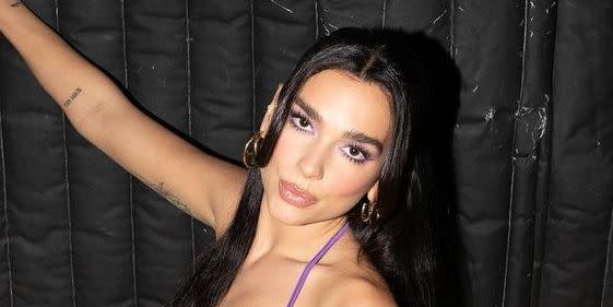 Dua Lipa wore a sheer white dress with a bandeau bra and thigh-high slit to  a wedding in France - Yahoo Sports