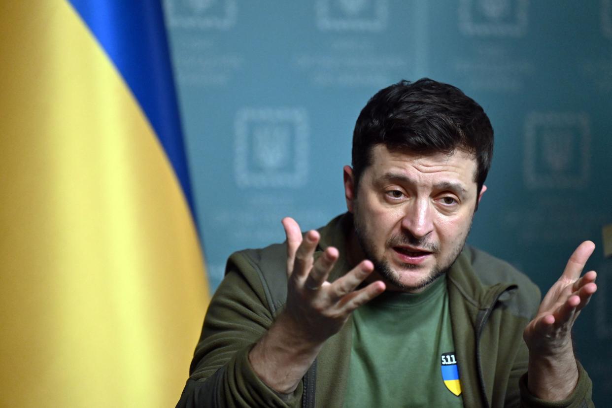 Ukrainian President Volodymyr Zelensky gestures as he speaks during a press conference in Kyiv on Thursday.