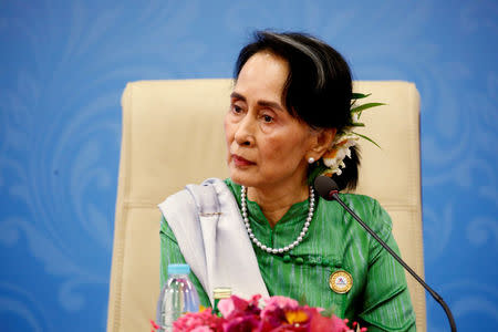 Myanmar State Counselor Aung San Suu Kyi attends a news conference at the Asia Europe Foreign Ministers (ASEM) in Naypyitaw, Myanmar, November 21, 2017. REUTERS/Stringer NO RESALE. NO ARCHIVE.