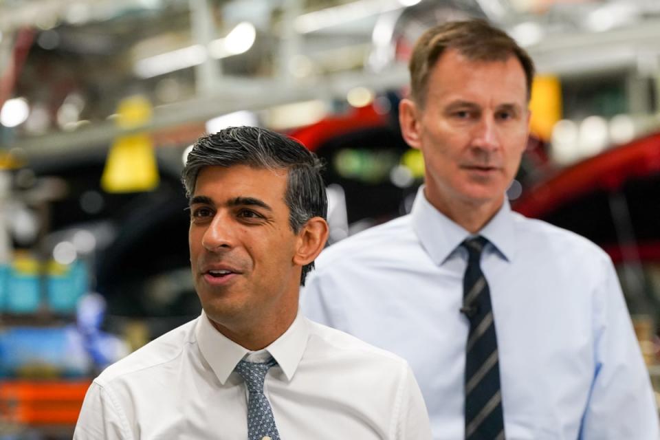 Rishi Sunak and Jeremy Hunt have promised to boost economic growth and tackle inflation (Getty Images)