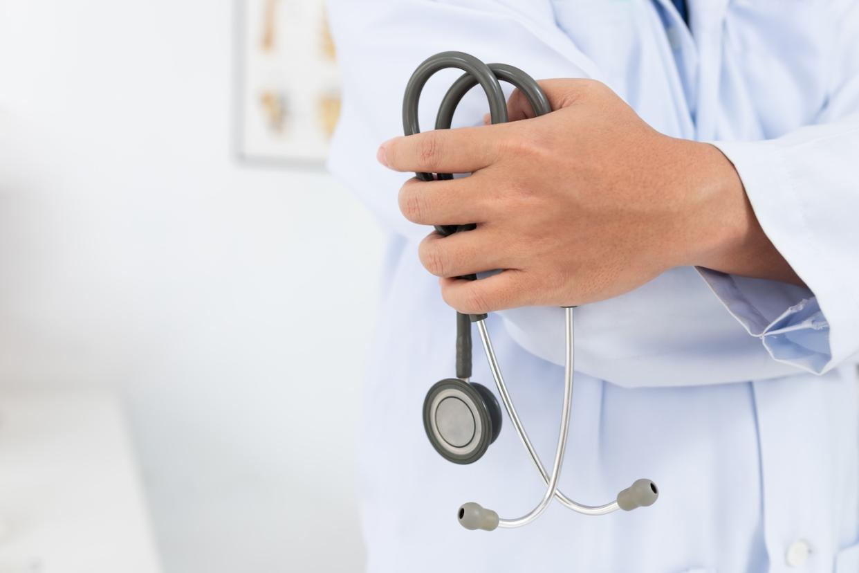 Doctor with stethoscope in hand