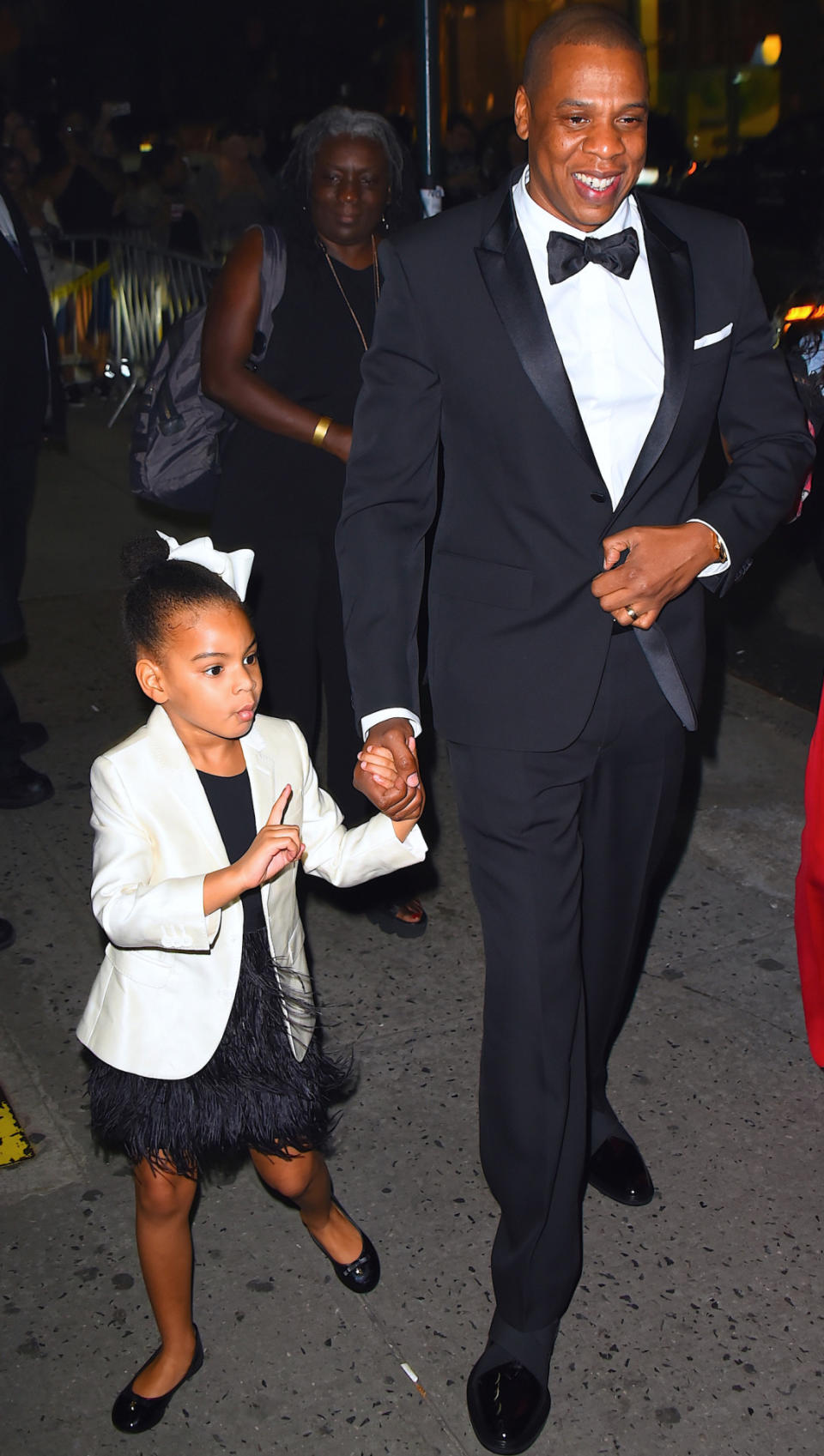 The best part of Blue’s appearance there was when the bow-wearing tot arrived with dad. Photographers outside quickly grabbed their cameras, but she appeared to give ’em a good finger wag. Kinda like: No, no, no. I’ll tell you how this photo op is gonna go down. (Photo: Robert Kamau/GC Images)