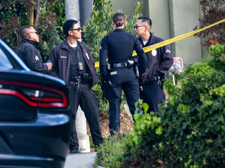 Beverly Hills, CA - January 28: LAPD officers 2700 block of Ellison Drive near the corner of Arby Dr on Saturday, Jan. 28, 2023, in Beverly Hills, CA. The street is blocked off due to a police investigation. Police are investigating a shooting that occurred today in the Beverly Crest area of Los Angeles, bordering Beverly Hills, where allegedly three people were killed and four others were critically wounded. The initial dispatch was an ``assault with a deadly weapon call" in the 2700 block of Ellison Drive about 2:40 a.m., the Los Angeles Police Department's Media Relations Division reported. (Francine Orr / Los Angeles Times)