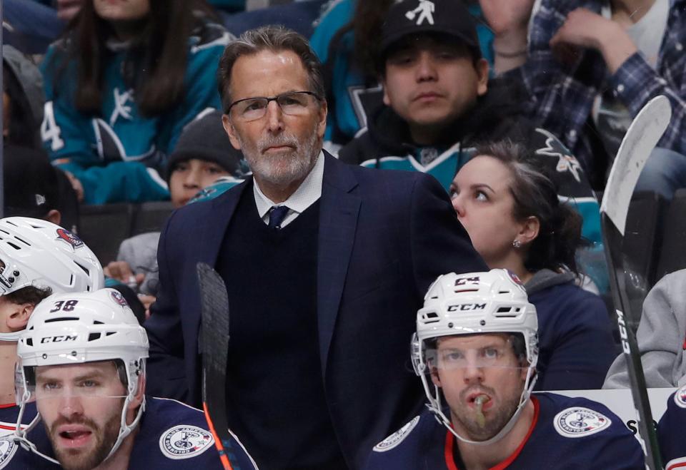 FILE - Columbus Blue Jackets coach John Tortorella watches the team play against the San Jose Sharks during an NHL hockey game in San Jose, Calif., Jan. 9, 2020. The Philadelphia Flyers have hired Tortorella as their new coach, hoping the veteran can help lead them to their first Stanley Cup since 1975. Tortorella coached Tampa Bay to a Stanley Cup title in 2004. He also coached the New York Rangers and Vancouver Canucks. He was fired in May 2021 after six seasons with the Blue Jackets.(AP Photo/Jeff Chiu, File)