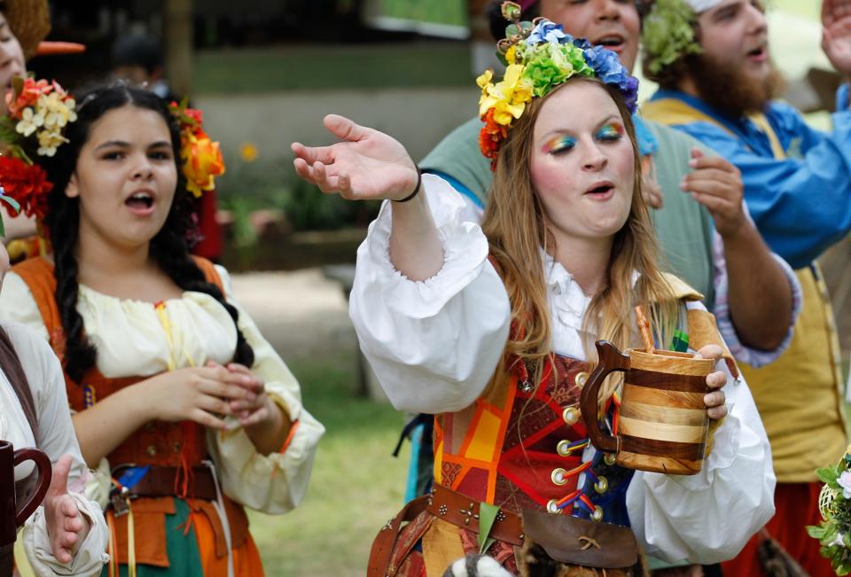 Naomi Houser, as Mary Meetagain, Queen of the May, sings with the Bristol Buskin Frolik on July 7, 2013. The Renaissance Faire features a variety of 16th century arts, games, food, music, comedy and dance.