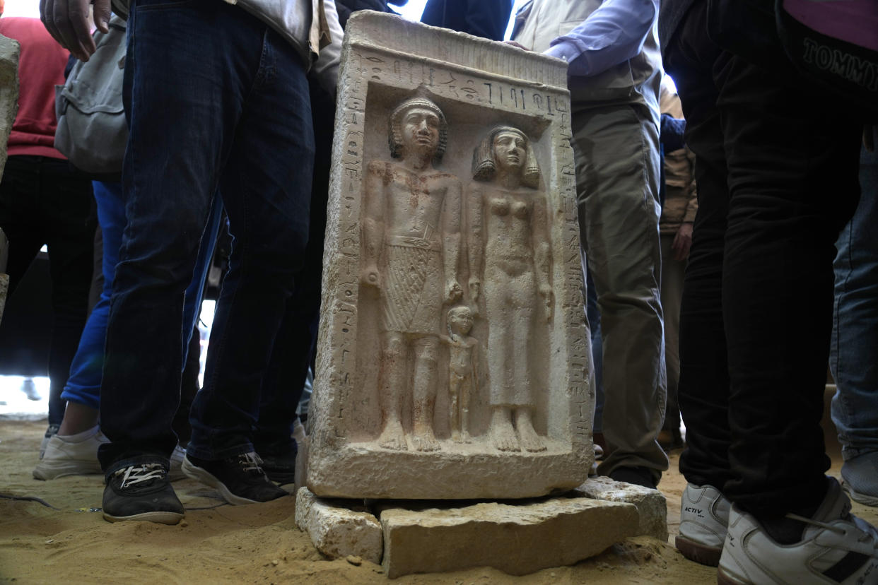 A recently discovered artifact is displayed at the site of the Step Pyramid of Djoser in Saqqara, 24 kilometers (15 miles) southwest of Cairo, Egypt, Thursday, Jan. 26, 2023. Egyptian archaeologist Zahi Hawass, the director of the Egyptian excavation team, announced that the expedition found a group of Old Kingdom tombs dating to the fifth and sixth dynasties of the Old Kingdom, indicating that the site comprised a large cemetery. (AP Photo/Amr Nabil)
