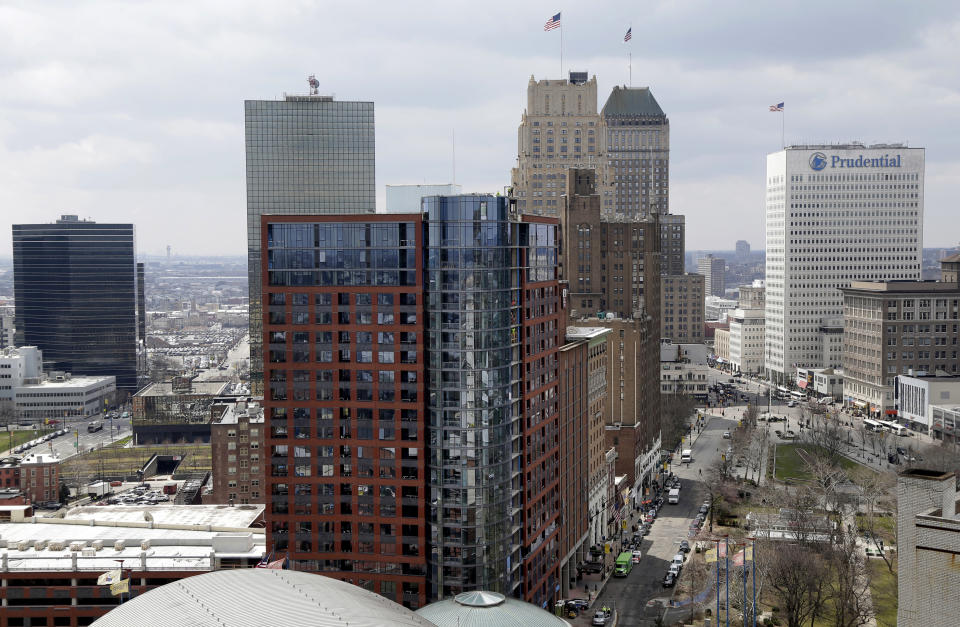 FILE - This April 10, 2018, file photo shows part of the skyline in Newark, N.J. Officials in Newark, which was one of the 18 finalists that Amazon rejected in November when it announced it would split its HQ2 between New York and northern Virginia, sent a giant heart that said “NJ & Newark Still Love U, Amazon!” The love note came despite Amazon saying it’s not seeking a new site. (AP Photo/Seth Wenig, File)