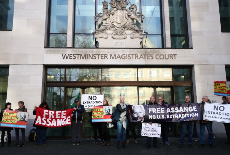 Supporters of WikiLeaks' founder Julian Assange gather outside Westminster Magistrates Court in London