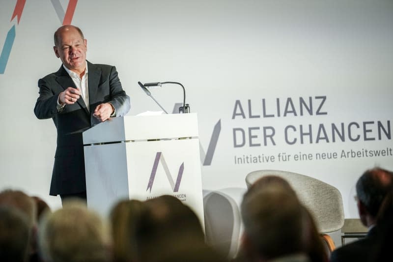 German Chancellor Olaf Scholz speaks at the Alliance of Opportunities network meeting. Currently, 65 companies from 16 sectors have already joined forces to form the Alliance of Opportunities, with the overarching aim of helping people find work. Kay Nietfeld/dpa