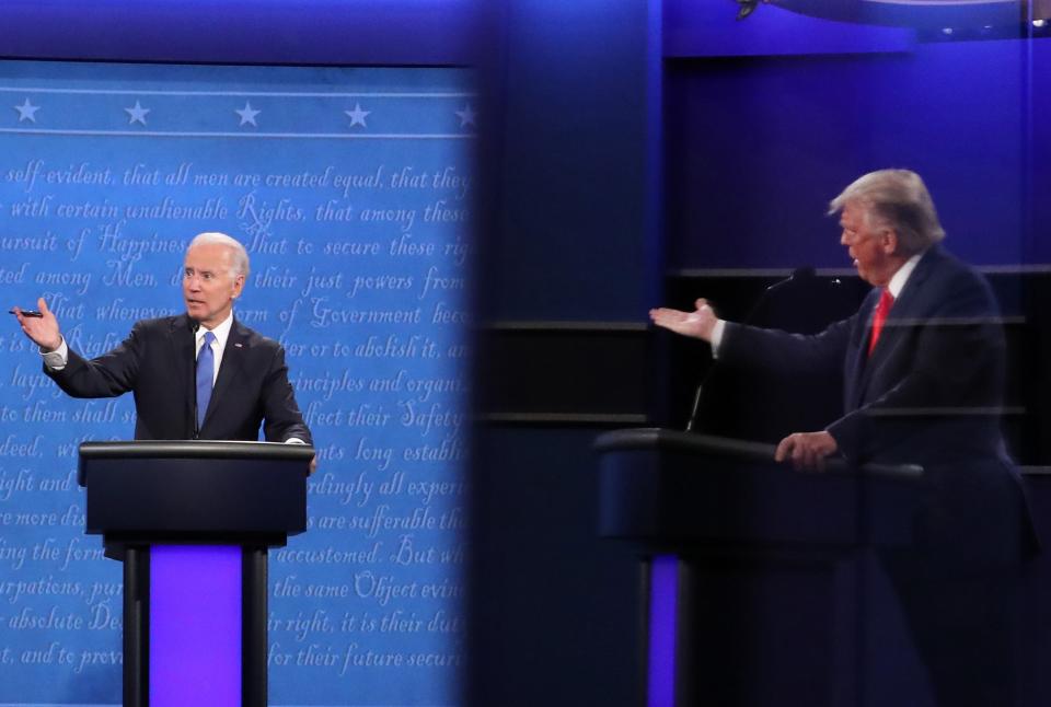 From left, former vice president Joe Biden and President Donald Trump traded blows about each other’s finances at the 2020 presidential debate. (Getty Images)
