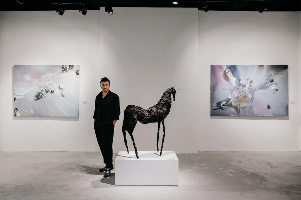 Lionel Sabatté, French contemporary artist with his art sculpture at Cuturi Gallery in Singapore. (PHOTO: Cuturi Gallery)