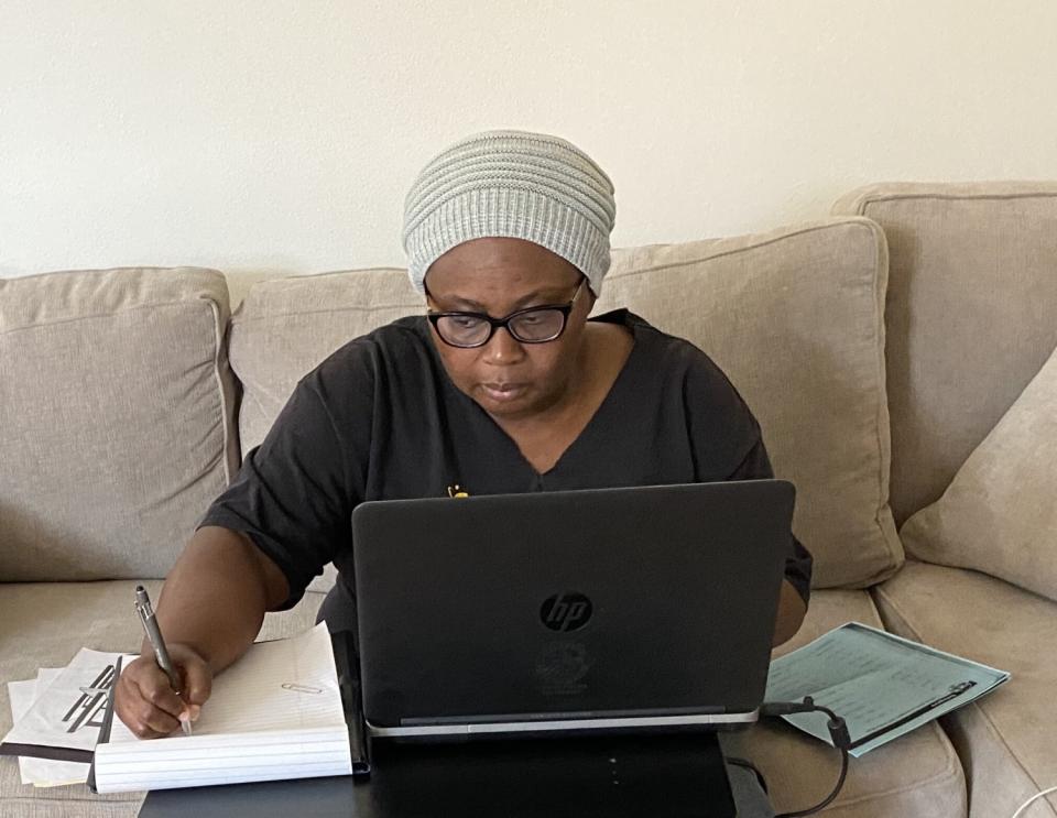 Sixth-grade teacher Aba Ngissah works from home