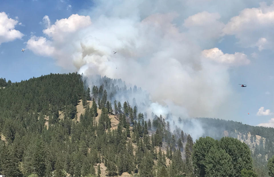 Firefighting helicopters respond to a fire near OU3 in Montana. (U.S. Forest Service)