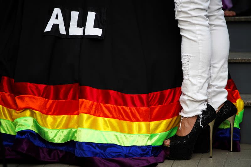 FILE PHOTO: An LGBT activist attends an International Day Against Homophobia, Transphobia and Biphobia at Bangkok's Art Center