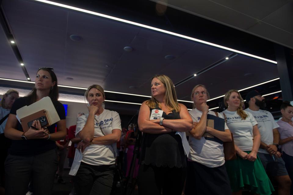 People against the deal line up to speak during a community meeting concerning the Nashville Fairgrounds Speedway and potential deal with Bristol Motor Speedway at Geodis Park in Nashville , Tenn., Tuesday, July 25, 2023.