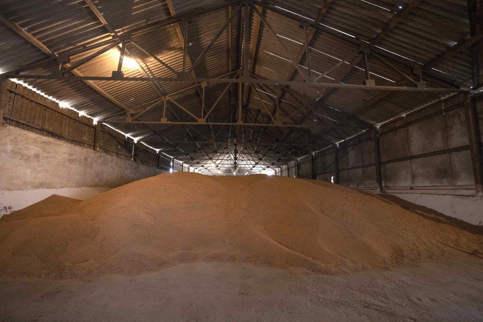 FILE - A wheat warehouse belonging to Ivan Kilgan, head of the regional agricultural association village, in Luky village, in western Ukraine, on March 25, 2022. The northwestern Lviv region near the border with Poland, far from the heart of what is known as Ukraine's breadbasket in the south, is being asked to plant all the available fields it can, said Kilgan. How to prevent food insecurity and skyrocketing prices globally as Russia continues its war in Ukraine will be the marquee topic of discussion at the IMF and World Bank Spring Meetings in Washington. (AP Photo/Nariman El-Mofty, File)