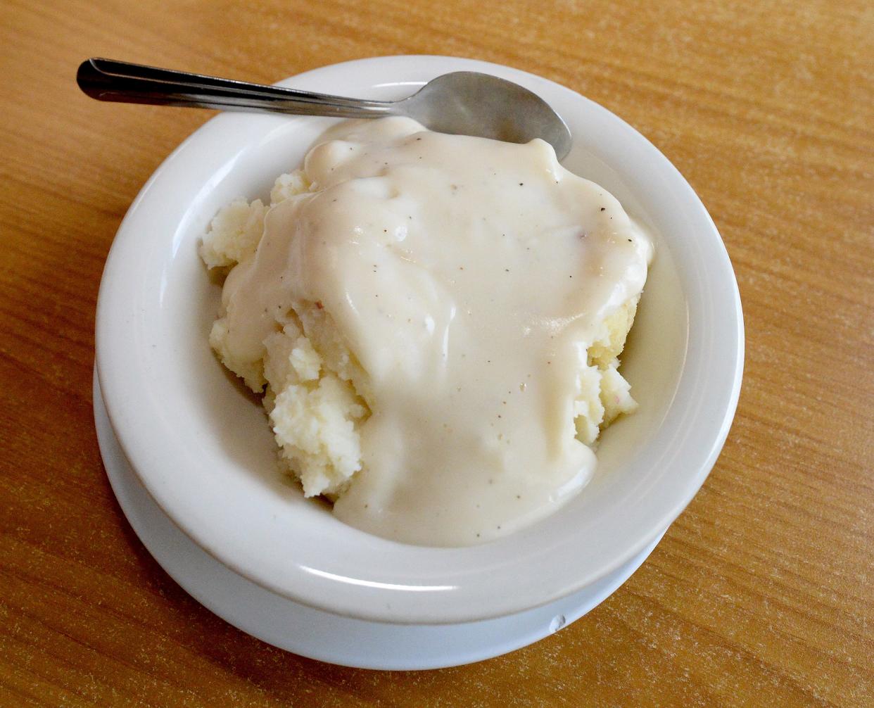 A bowl of mashed potatoes and gravy at Sunrise Cafe in Springfield. Mashed potatoes are the favorite Thanksgiving side dish in Illinois.