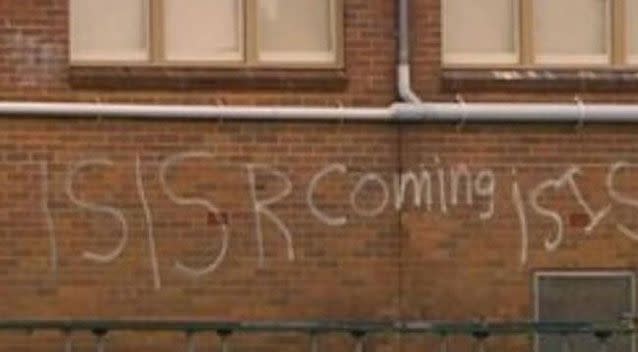 THe crude pro-ISIS graffiti sprayed on the wall at East Hills Boys High School in 2014. Siource: 7 News