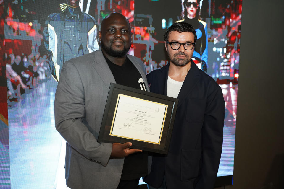 Rocco Iannone, creative director of Ferrari, receiving his honorary master’s degree in fashion design from Istituto Marangoni Miami.