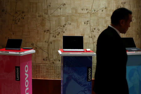 Products of Lenovo are displayed during a news conference on the company's annual results in Hong Kong May 26, 2016. REUTERS/Bobby Yip