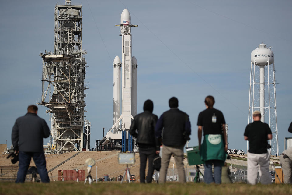 <p>The SpaceX Falcon Heavy rocket sits on launch pad 39A at Kennedy Space Center as it is prepared for tomorrow’s lift-off on Feb.5, 2018 in Cape Canaveral, Fla. (Photo: Joe Raedle/Getty Images) </p>