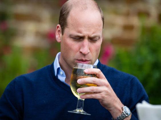 The Duke of Cambridge takes a sip of an Aspalls cider at The Rose and Crown pub in Snettisham, Norfolk. (PA)