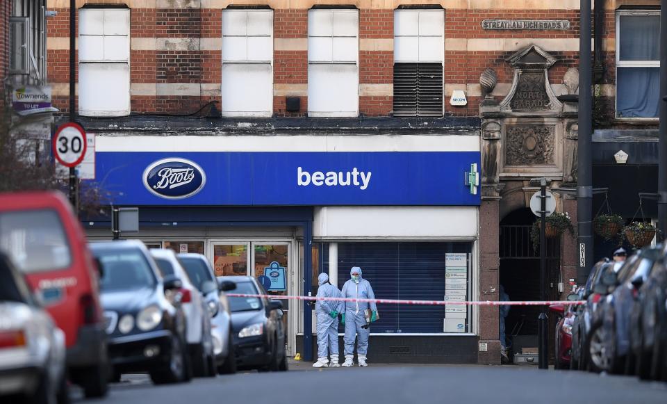 Police forensic officers work outside of a Boots store on Streatham High Road in south London on February 3, 2020, after a man was shot dead by police on February 2, following reports he had stabbed two people. - A man wearing a "hoax device" shot dead by police in London Sunday after stabbing two people had recently been released from prison for previous terrorism offences, British media reported. The suspect, Sudesh Amman, was released last month after serving around half of an approximate three-year sentence for disseminating terrorist material, according to multiple reports. (Photo by DANIEL LEAL-OLIVAS / AFP) (Photo by DANIEL LEAL-OLIVAS/AFP via Getty Images)