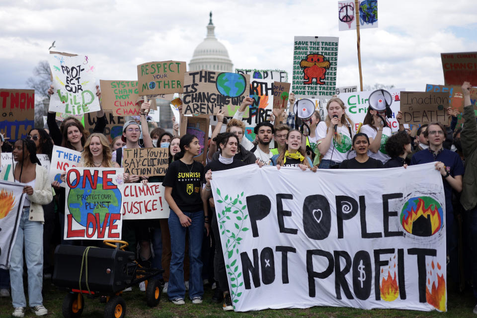 Environmental activists rally on Capitol Hill 