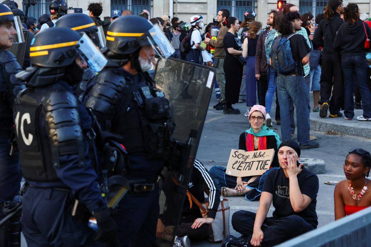 People protest in support of Nahel, a 17-year-old teenager killed by a French police officer during a traffic stop, at Place de la Concorde (REUTERS)