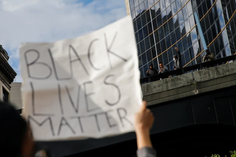 Protesters rally against the death in Minneapolis police custody of George Floyd, in Seattle