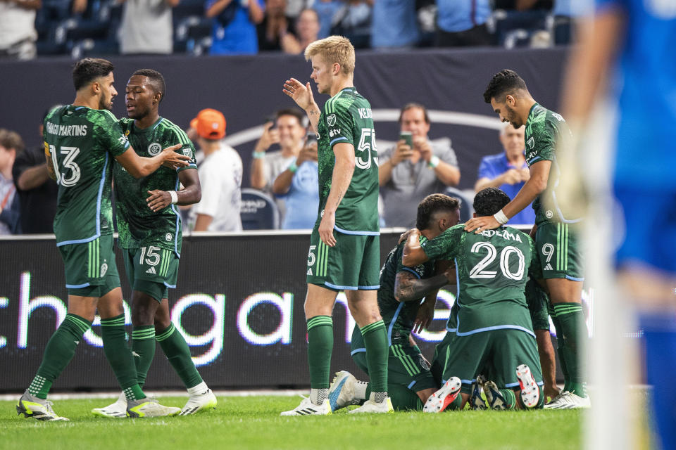 CORRECTS TEAM CELEBRATING TO NEW YORK CITY FC - New York City FC players celebrate a goal against CF Montreal during the first half of an MLS soccer match at Yankee Stadium, Wednesday, Aug. 30, 2023, in New York. (AP Photo/Eduardo Munoz Alvarez)