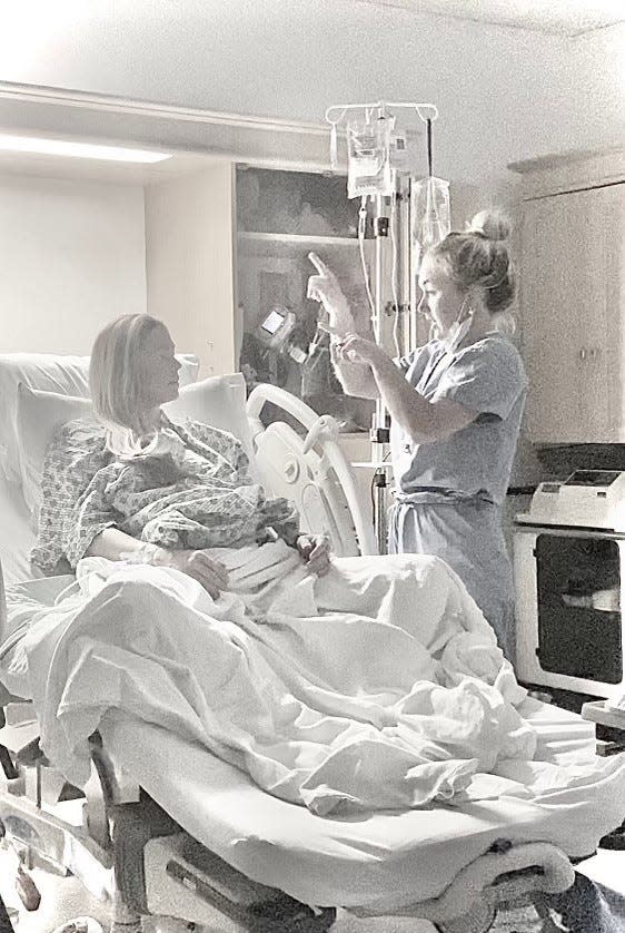 Allie LaForce talks to her sister, Dr. AuBree LaForce, while in labor at Cleveland Clinic Akron General in November.